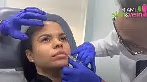 Patient receiving aesthetic treatment in clinic.