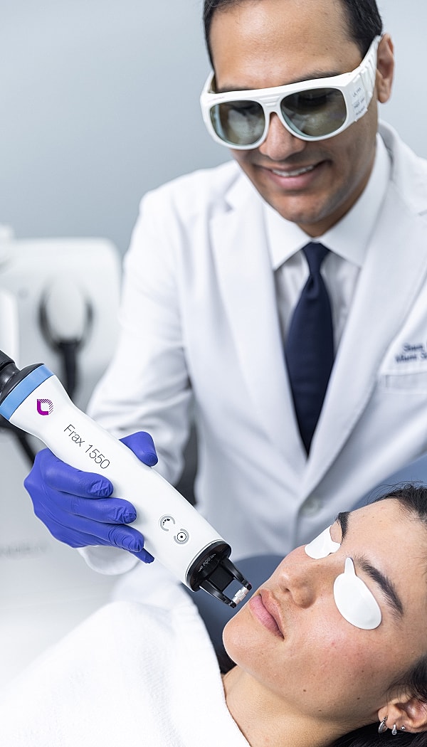 Laser treatment in a cosmetic clinic session.