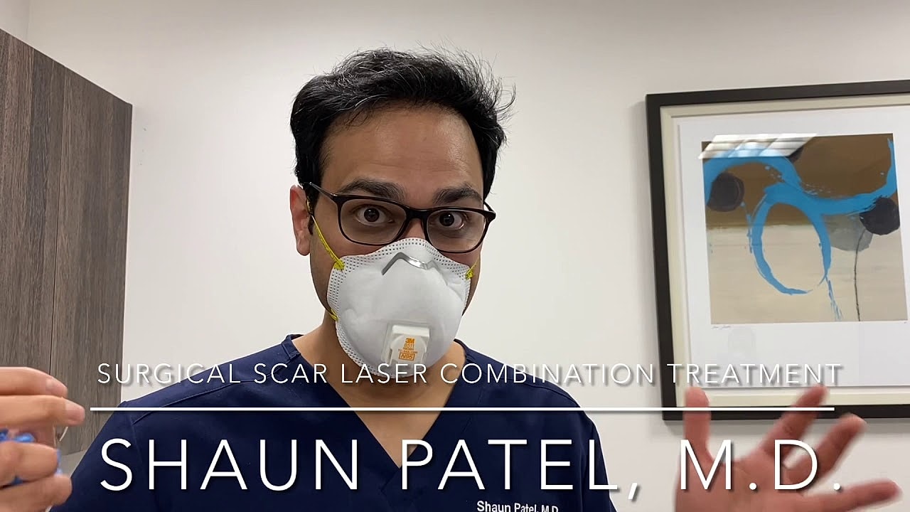 Doctor explaining surgical scar laser treatment.