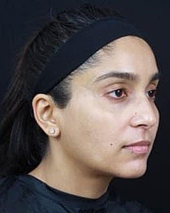 Profile of a woman with natural makeup.