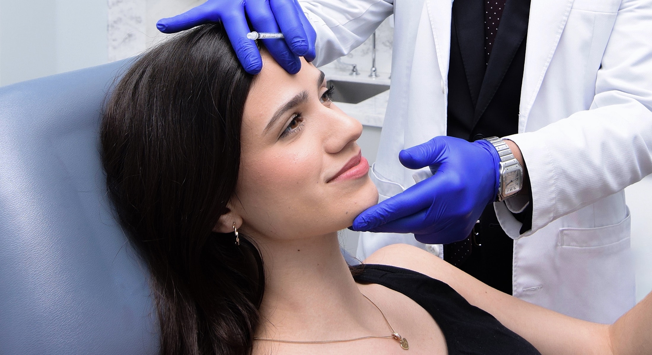 Patient receiving cosmetic treatment in clinic.