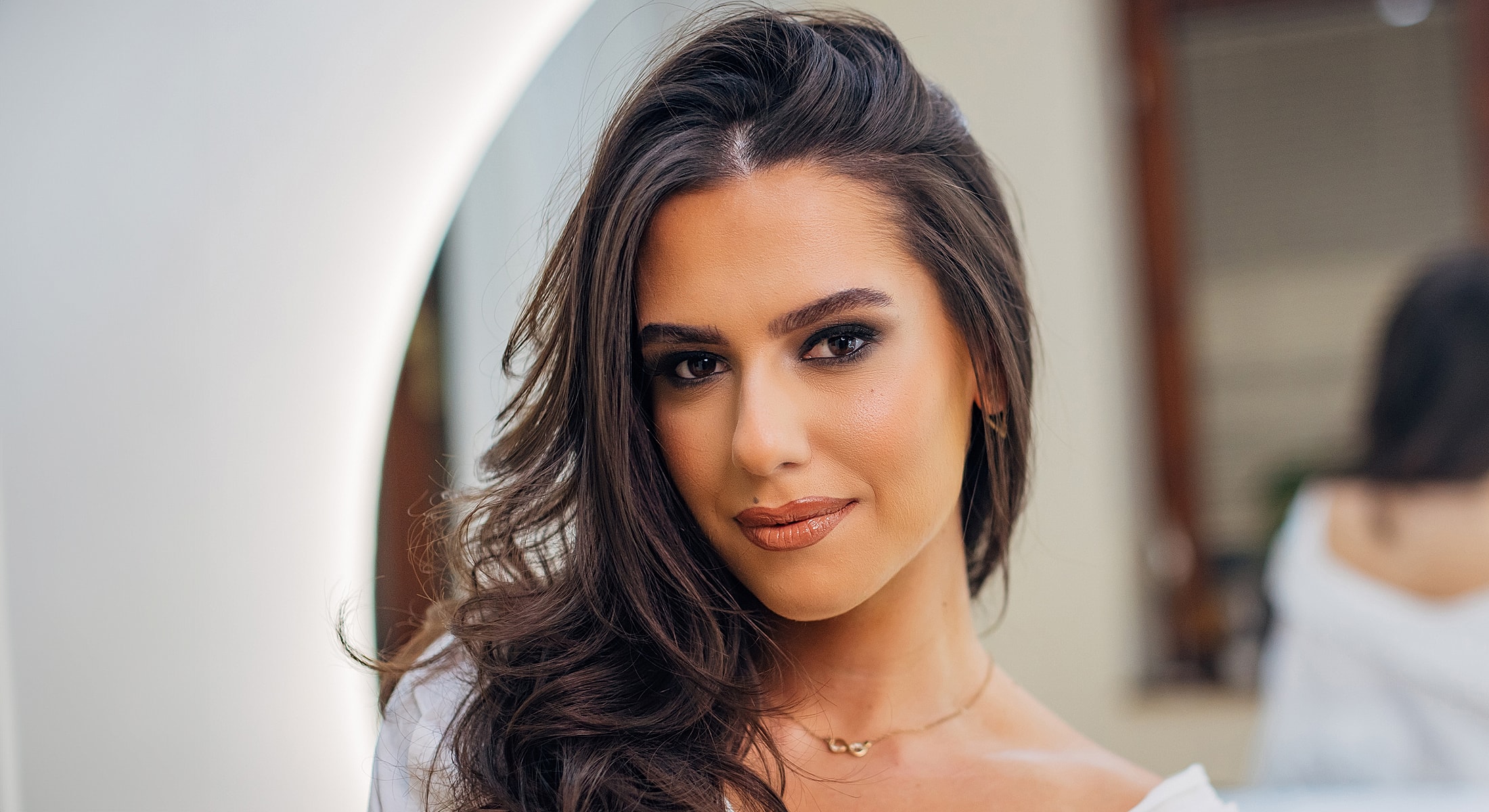 Portrait of woman with makeup and stylish hair.