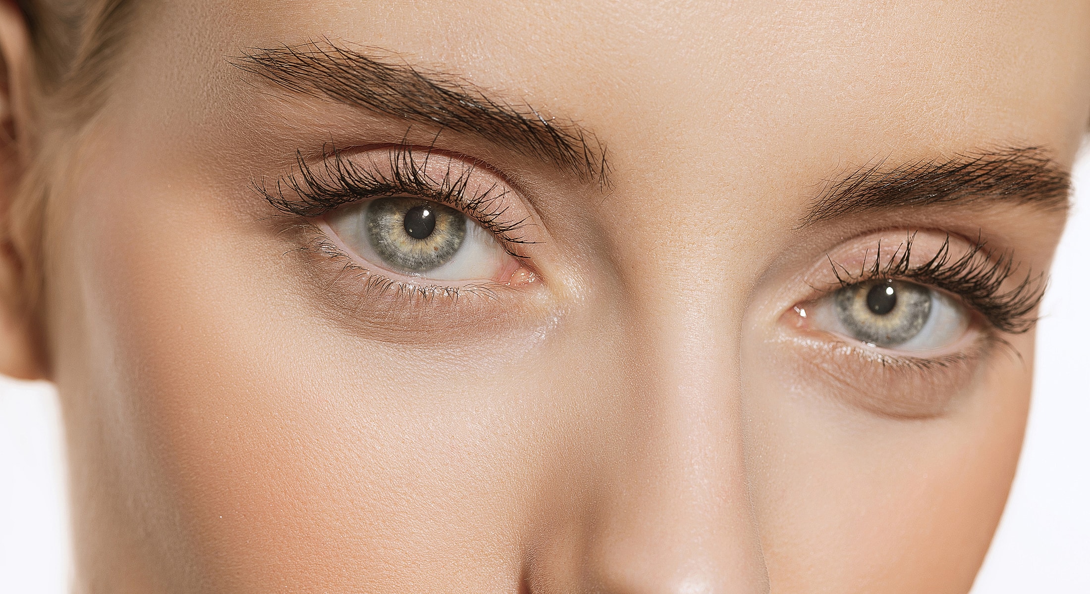 Close-up of captivating grey-blue eyes.