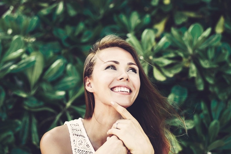 woman picking laser treatment